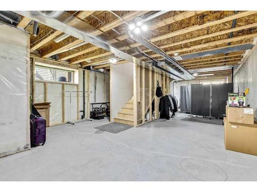 20 Wolf Crescent, Okotoks, AB - Indoor Photo Showing Basement