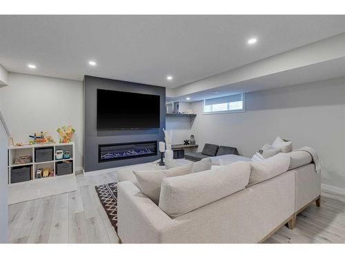 61 Autumn Green Se, Calgary, AB - Indoor With Fireplace