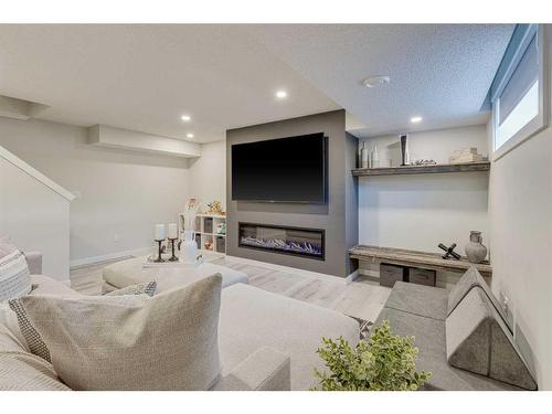 61 Autumn Green Se, Calgary, AB - Indoor With Fireplace