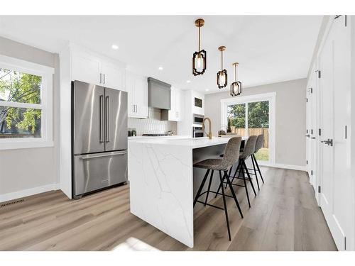 7708 Silver Springs Road Nw, Calgary, AB - Indoor Photo Showing Kitchen With Upgraded Kitchen