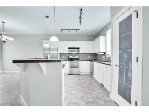 277 West Creek Boulevard, Chestermere, AB - Indoor Photo Showing Kitchen With Upgraded Kitchen