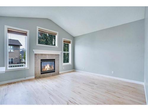 277 West Creek Boulevard, Chestermere, AB - Indoor Photo Showing Living Room With Fireplace