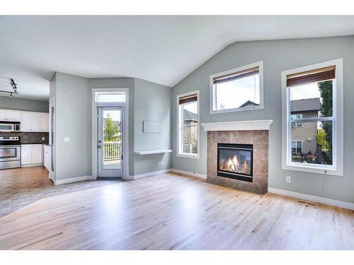 277 West Creek Boulevard, Chestermere, AB - Indoor Photo Showing Living Room With Fireplace