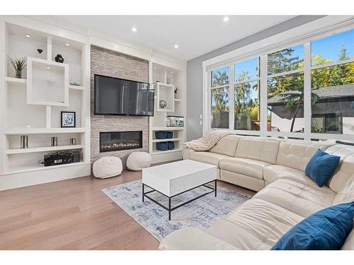 3240 Kerrydale Road Sw, Calgary, AB - Indoor Photo Showing Living Room With Fireplace