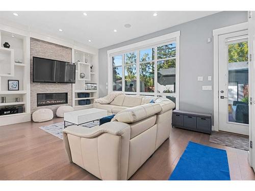 3240 Kerrydale Road Sw, Calgary, AB - Indoor Photo Showing Living Room With Fireplace