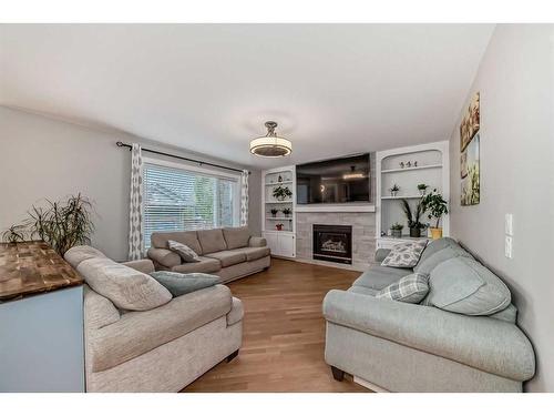 51 Chaparral Link Se, Calgary, AB - Indoor Photo Showing Living Room With Fireplace