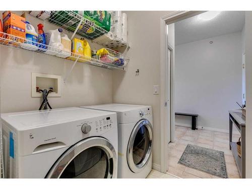 311-4507 45 Street Sw, Calgary, AB - Indoor Photo Showing Laundry Room