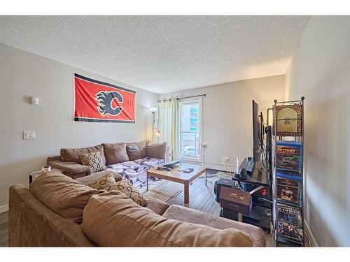 306-1820 9, Calgary, AB - Indoor Photo Showing Living Room