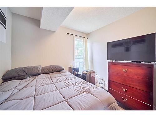 306-1820 9, Calgary, AB - Indoor Photo Showing Bedroom