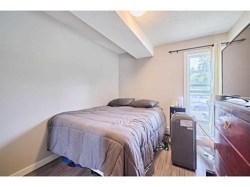 306-1820 9, Calgary, AB - Indoor Photo Showing Bedroom