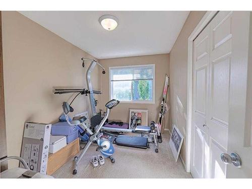 133 Citadel Pointe Nw, Calgary, AB - Indoor Photo Showing Gym Room