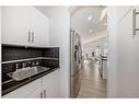 23 Royal Ridge Manor Nw, Calgary, AB  - Indoor Photo Showing Kitchen 