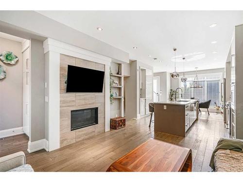 2614 19 Avenue Sw, Calgary, AB - Indoor Photo Showing Living Room With Fireplace