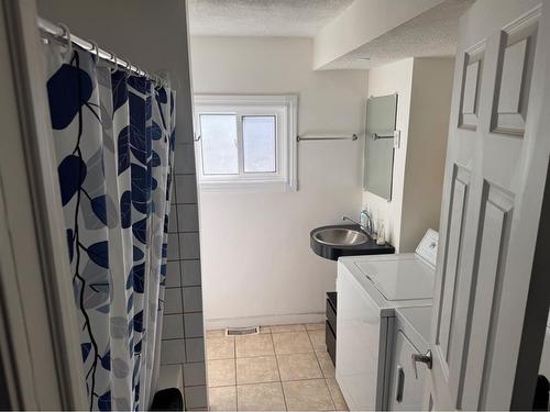 419 2Nd Street Se, High River, AB - Indoor Photo Showing Laundry Room