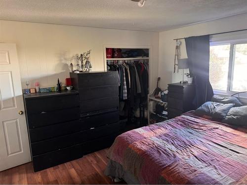 419 2Nd Street Se, High River, AB - Indoor Photo Showing Bedroom