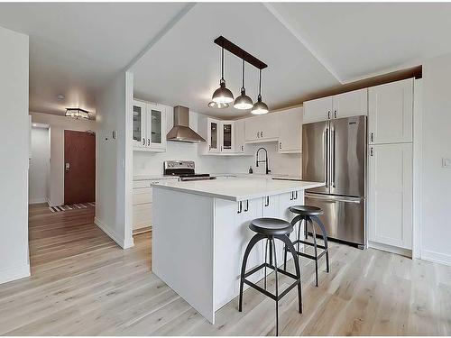 202-1020 14 Avenue Sw, Calgary, AB - Indoor Photo Showing Kitchen With Upgraded Kitchen