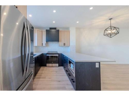 216 Corner Glen Avenue Ne, Calgary, AB - Indoor Photo Showing Kitchen With Stainless Steel Kitchen With Upgraded Kitchen