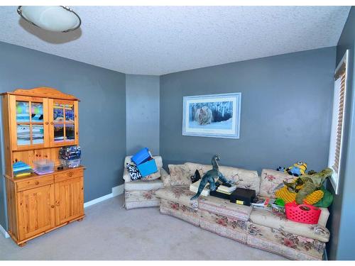 321 Crystal Shores View, Okotoks, AB - Indoor Photo Showing Bedroom