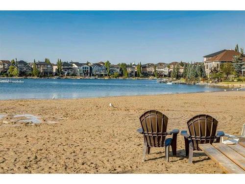 321 Crystal Shores View, Okotoks, AB - Outdoor With Body Of Water With View