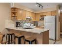 202-743 Railway Avenue, Canmore, AB  - Indoor Photo Showing Kitchen 