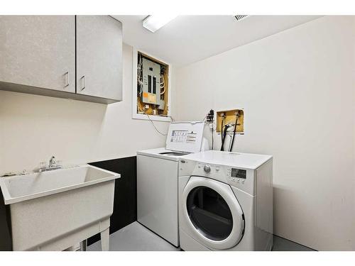 5A Radcliffe Crescent Se, Calgary, AB - Indoor Photo Showing Laundry Room