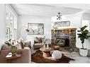 608 1 Avenue Nw, Calgary, AB  - Indoor Photo Showing Living Room With Fireplace 