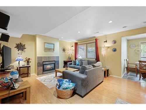 8 Mt Douglas Circle Se, Calgary, AB - Indoor Photo Showing Living Room With Fireplace