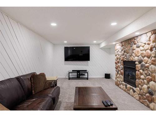 31 Cherry Valley Court, Rural Rocky View County, AB - Indoor Photo Showing Living Room With Fireplace