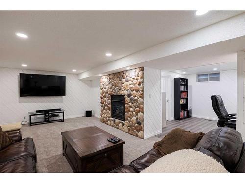 31 Cherry Valley Court, Rural Rocky View County, AB - Indoor Photo Showing Living Room With Fireplace