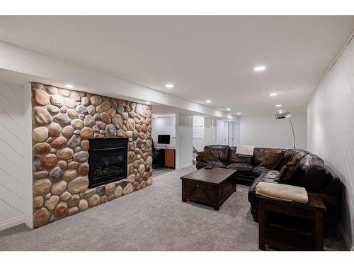 31 Cherry Valley Court, Rural Rocky View County, AB - Indoor Photo Showing Living Room With Fireplace