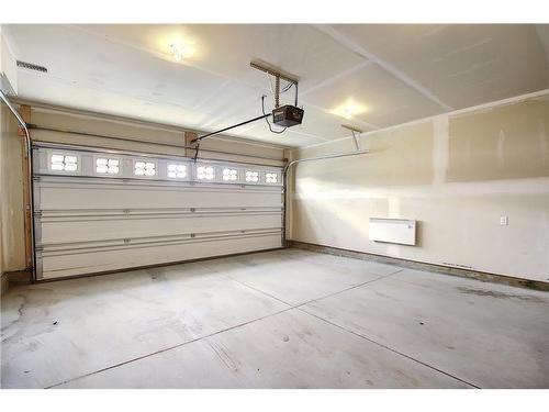 86 Nolan Hill Heights Nw, Calgary, AB - Indoor Photo Showing Garage