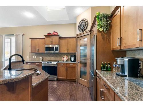 129 Royal Oak Heath Nw, Calgary, AB - Indoor Photo Showing Kitchen With Stainless Steel Kitchen With Double Sink With Upgraded Kitchen