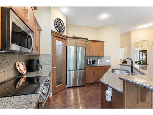 129 Royal Oak Heath Nw, Calgary, AB - Indoor Photo Showing Kitchen With Stainless Steel Kitchen With Double Sink