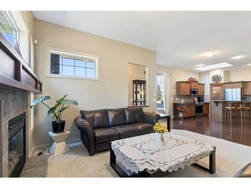 129 Royal Oak Heath Nw, Calgary, AB - Indoor Photo Showing Living Room With Fireplace