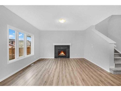 99 Red Embers Terrace Ne, Calgary, AB - Indoor Photo Showing Living Room With Fireplace