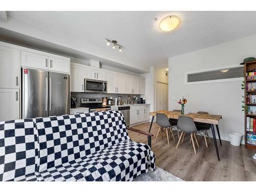 208-30 Walgrove Walk Se, Calgary, AB - Indoor Photo Showing Kitchen With Stainless Steel Kitchen