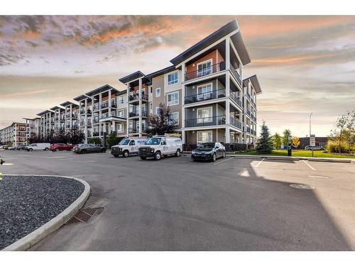 208-30 Walgrove Walk Se, Calgary, AB - Outdoor With Balcony With Facade