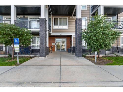 208-30 Walgrove Walk Se, Calgary, AB - Outdoor With Balcony With Facade