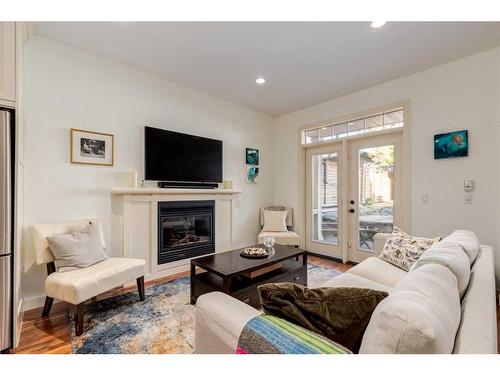 2014 42 Avenue Sw, Calgary, AB - Indoor Photo Showing Living Room With Fireplace