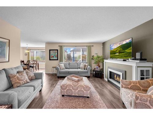 209 West Creek Circle, Chestermere, AB - Indoor Photo Showing Living Room With Fireplace