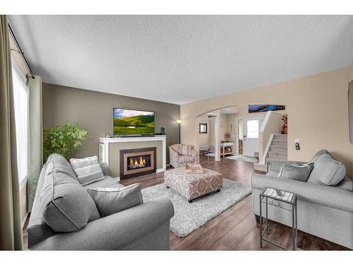 209 West Creek Circle, Chestermere, AB - Indoor Photo Showing Living Room With Fireplace