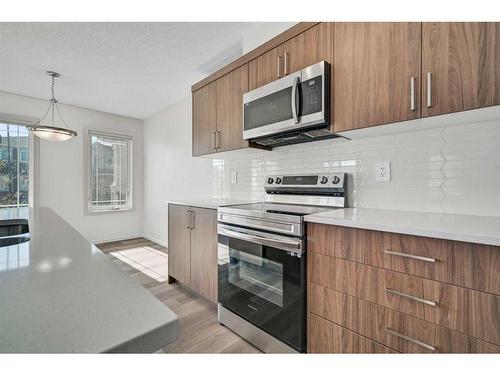 9 Carringwood Grove Nw, Calgary, AB - Indoor Photo Showing Kitchen