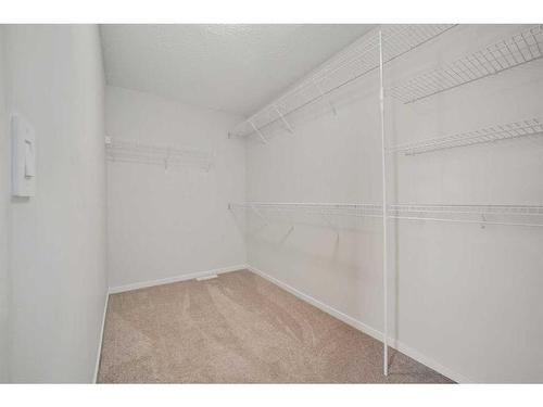 9 Carringwood Grove Nw, Calgary, AB - Indoor With Storage