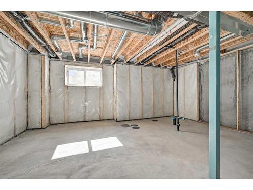 9 Carringwood Grove Nw, Calgary, AB - Indoor Photo Showing Basement