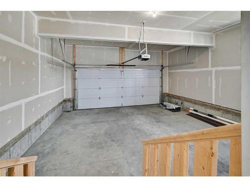 9 Carringwood Grove Nw, Calgary, AB - Indoor Photo Showing Garage