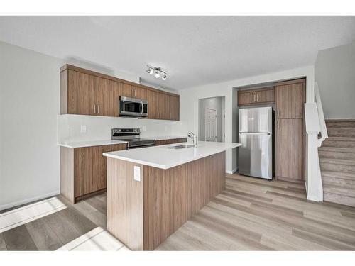 9 Carringwood Grove Nw, Calgary, AB - Indoor Photo Showing Kitchen With Stainless Steel Kitchen