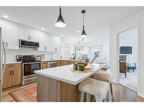 154 West Creek Bay, Chestermere, AB - Indoor Photo Showing Kitchen With Upgraded Kitchen