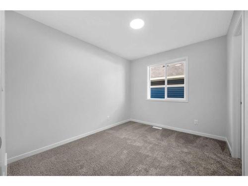 115 Aquila Drive Nw, Calgary, AB - Indoor Photo Showing Other Room