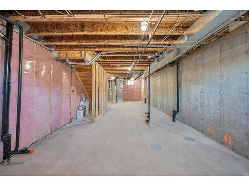 115 Aquila Drive Nw, Calgary, AB - Indoor Photo Showing Basement