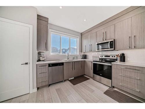 126 Dawson Harbour Grove, Chestermere, AB - Indoor Photo Showing Kitchen